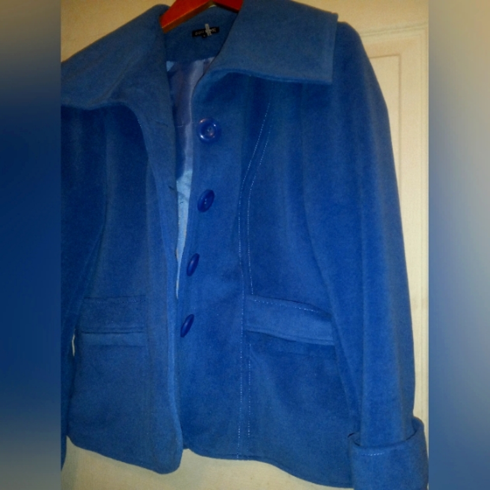 600 West, blue jacket, size L